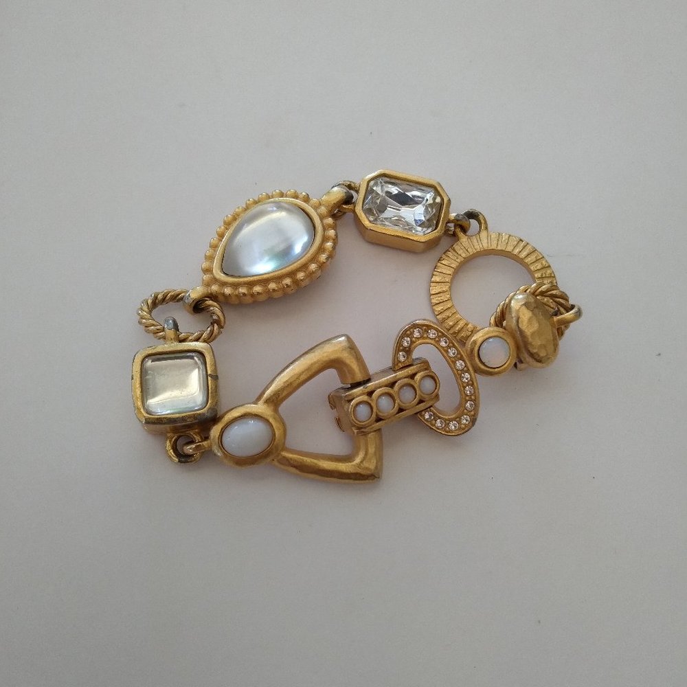 Gold tone ovals and triangle with simulated opals 3.5 inch bracelet